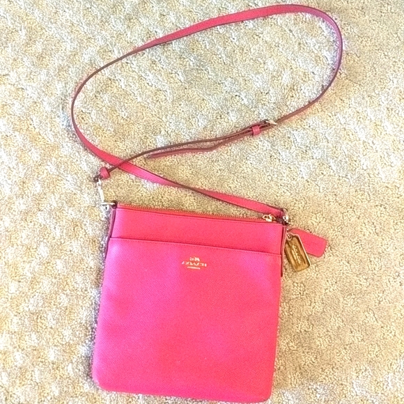 Coach Handbags - Coach crossbody, Pink with front pocket